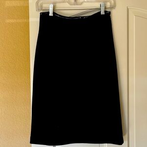 Beautiful black lined wool skirt by Equipment- size 2
High waisted